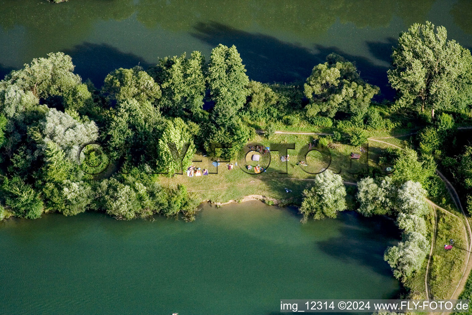 Bathers at the lake Hirschau in the district Hirschau in Tübingen in the state Baden-Wuerttemberg, Germany