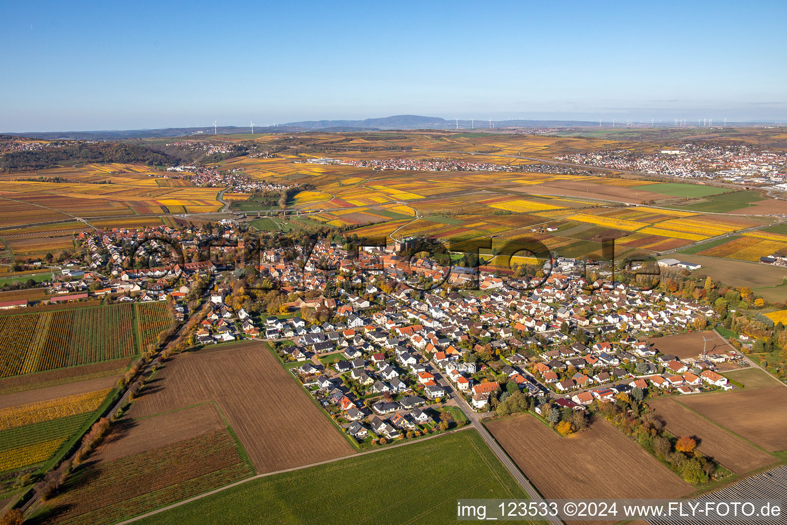 Aerial view of Autumnal discolored village view in Kirchheim an der Weinstrasse in the state Rhineland-Palatinate, Germany