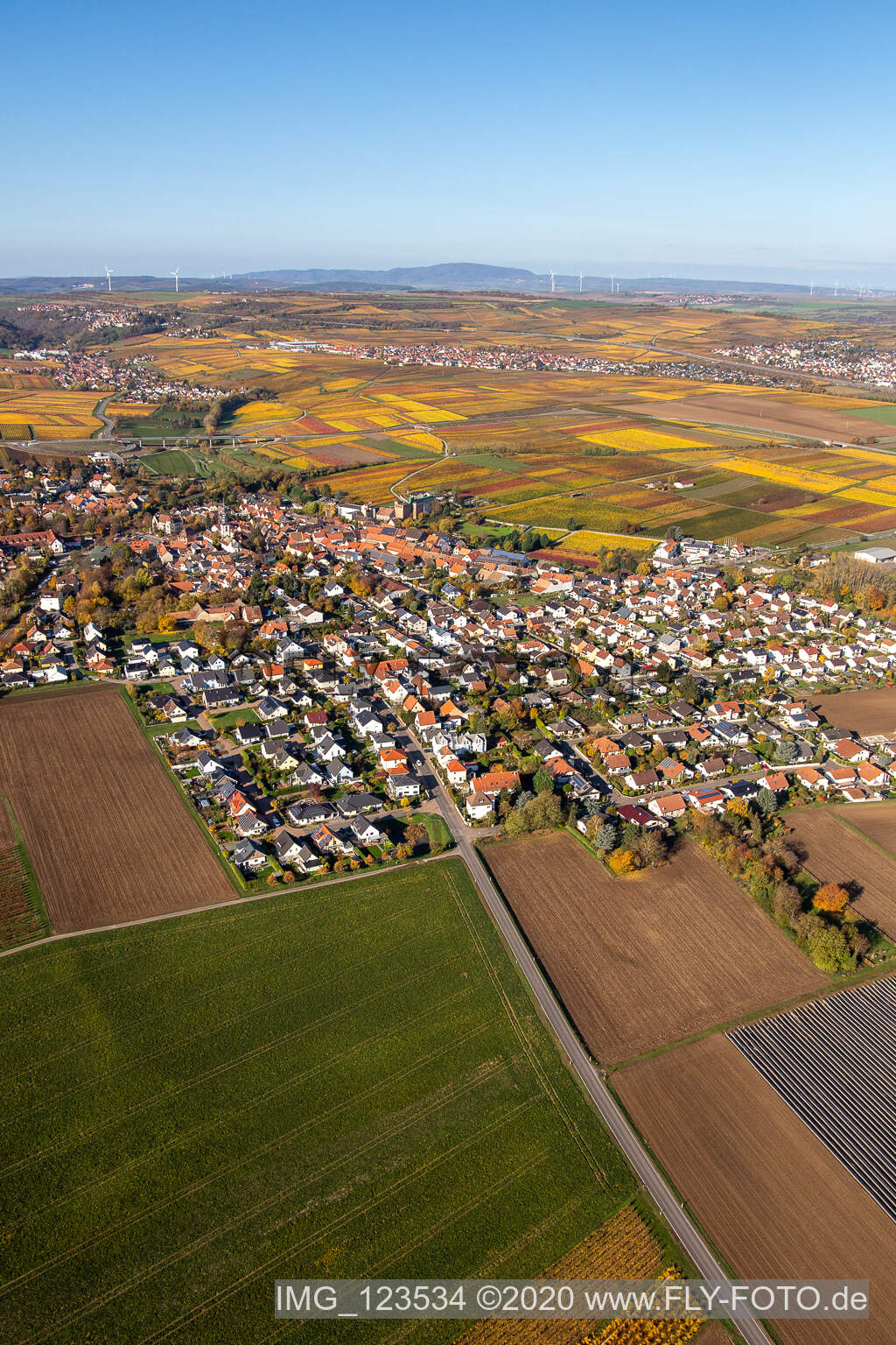 Aerial photograpy of Autumnal discolored village view in Kirchheim an der Weinstrasse in the state Rhineland-Palatinate, Germany