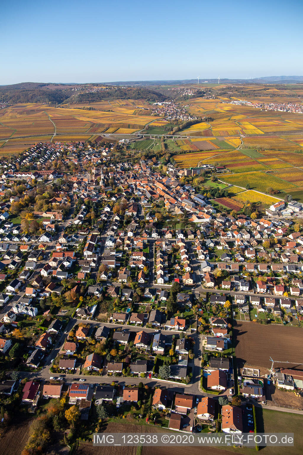 Autumnal discolored village view in Kirchheim an der Weinstrasse in the state Rhineland-Palatinate, Germany from above