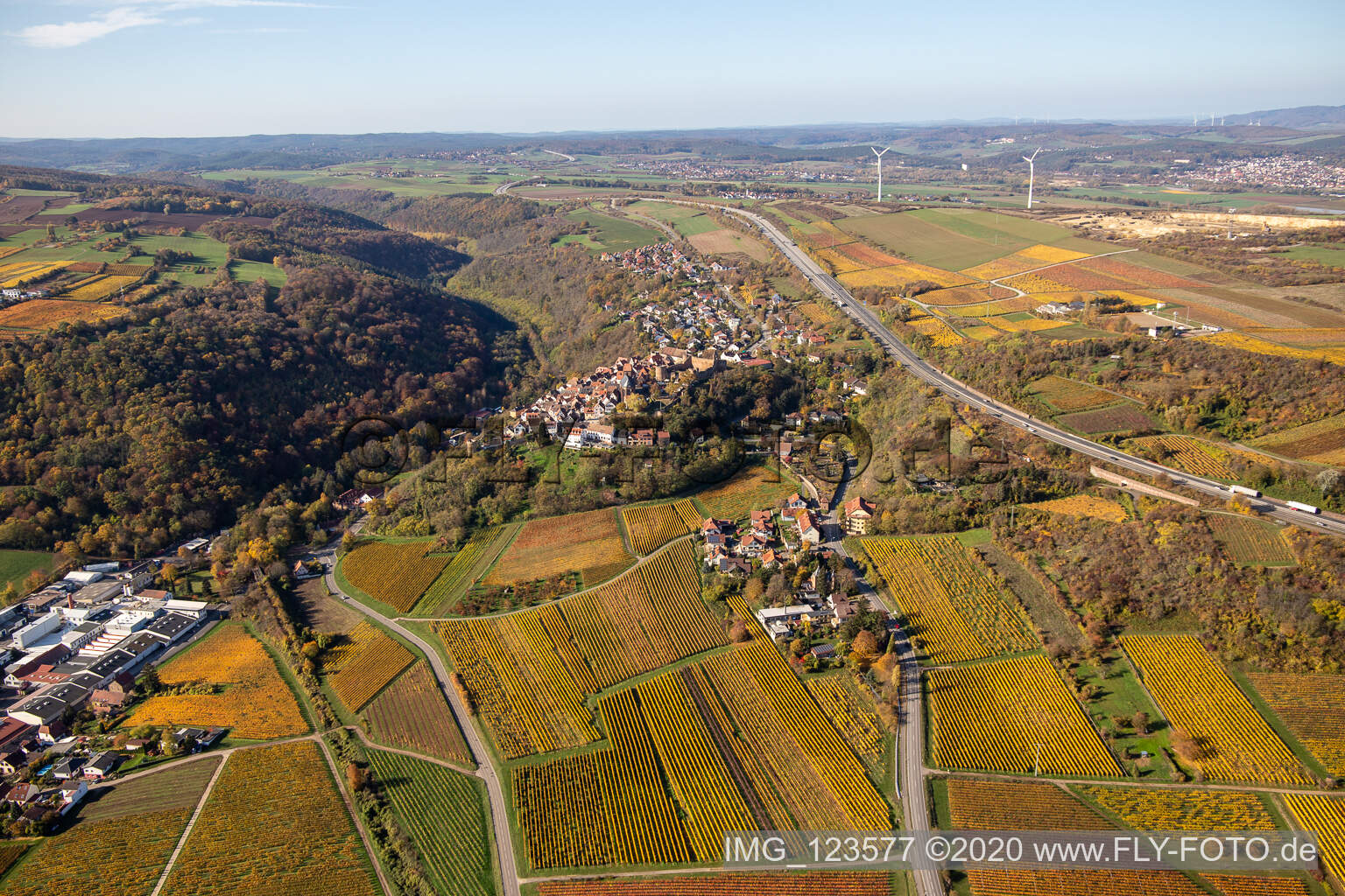 Aerial photograpy of Autumnal discolored vegetation view town center on the edge of vineyards and wineries in the wine-growing area in Neuleiningen in the state Rhineland-Palatinate, Germany