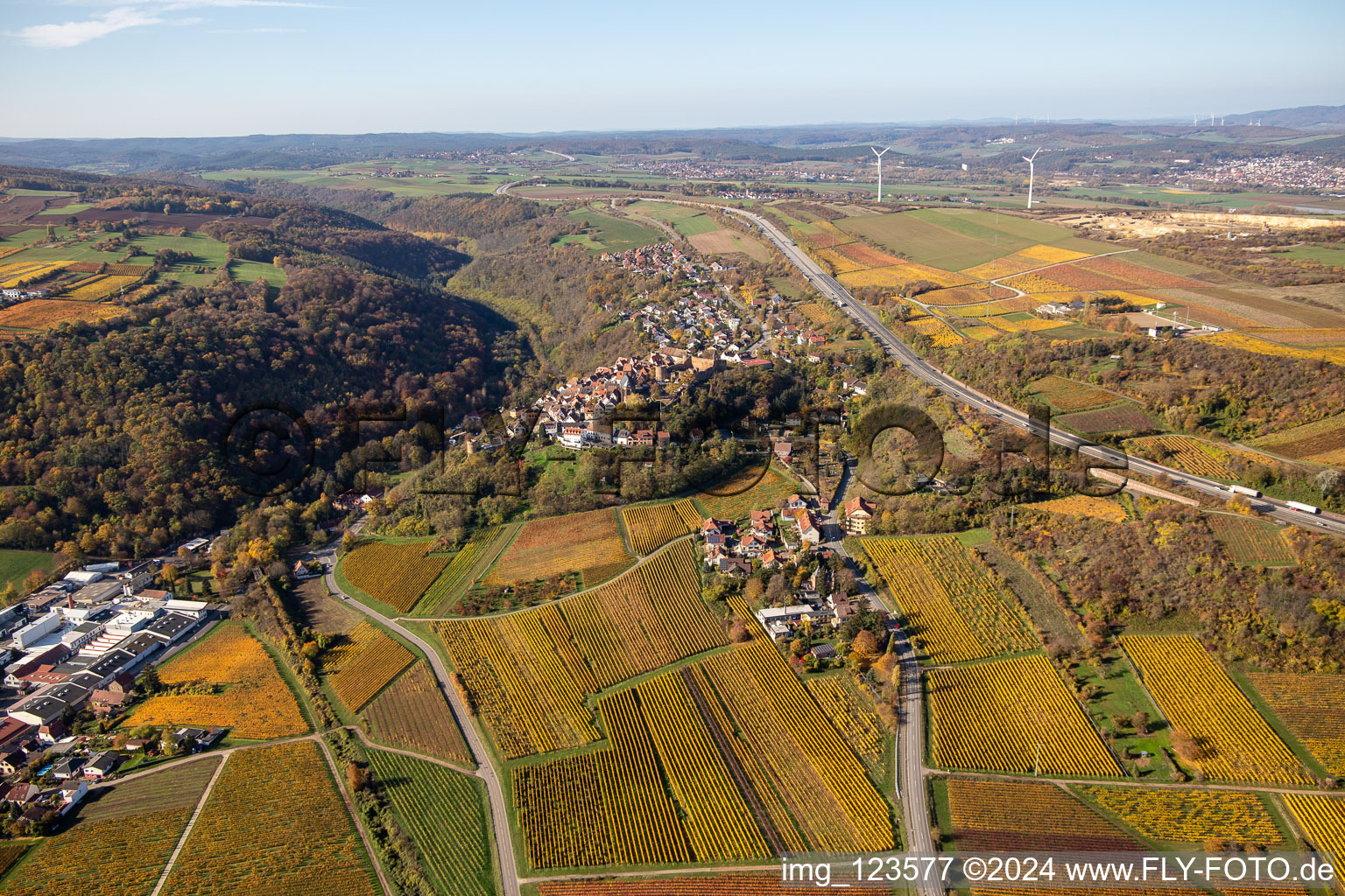 Aerial photograpy of Autumnal discolored vegetation view town center on the edge of vineyards and wineries in the wine-growing area in Neuleiningen in the state Rhineland-Palatinate, Germany