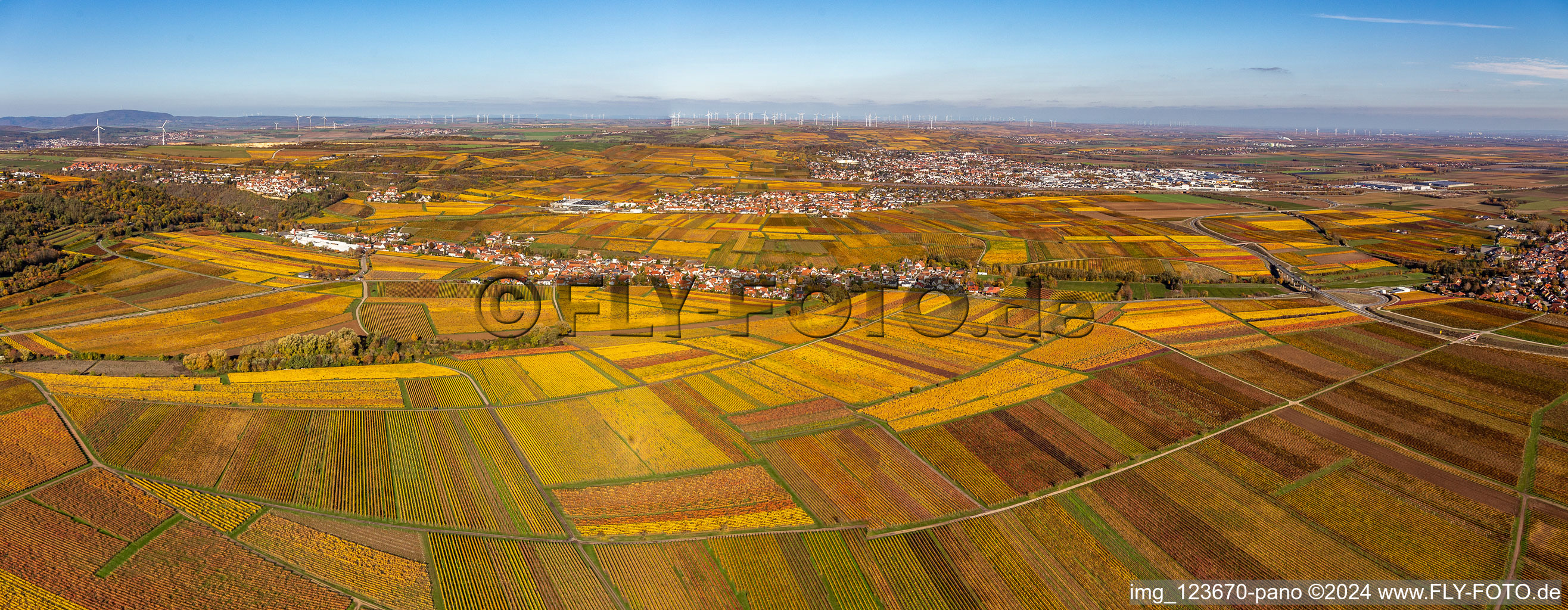 Panoramic perspective of the autumnal colored village view in Kleinkarlbach in the state Rhineland-Palatinate, Germany