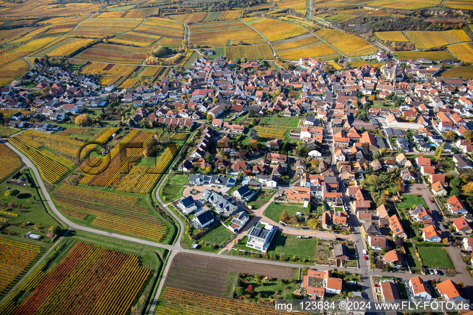 Aerial view of Autumnal discolored vegetation view village - view on the edge of wine yards in Kallstadt in the state Rhineland-Palatinate, Germany