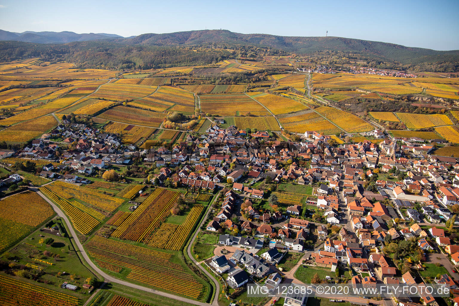Aerial photograpy of Autumnal discolored vegetation view village - view on the edge of wine yards in Kallstadt in the state Rhineland-Palatinate, Germany