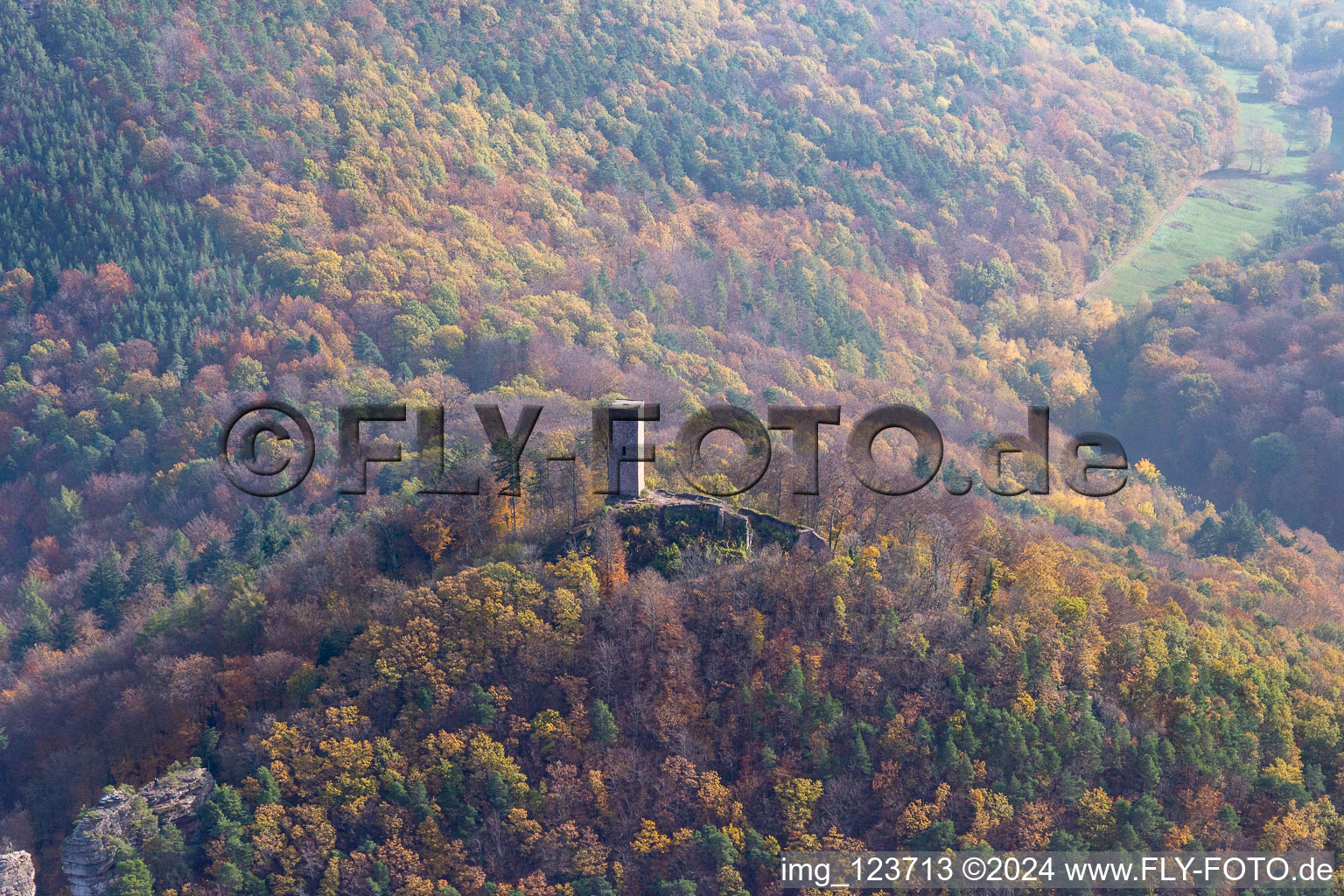 Autumnal discolored vegetation view of castle of the fortress Scharfeneck in Annweiler am Trifels in the state Rhineland-Palatinate, Germany