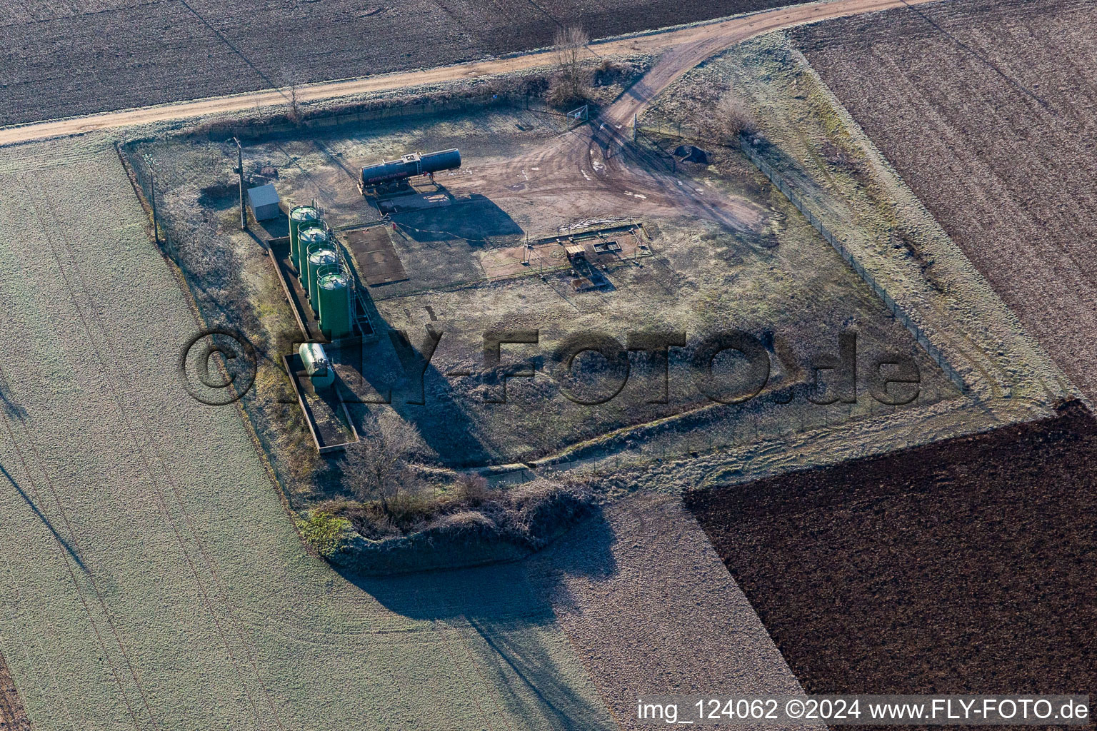 Aerial view of Tank and feed pump for oil production in the Rhine plain in Niederlauterbach in Grand Est, France