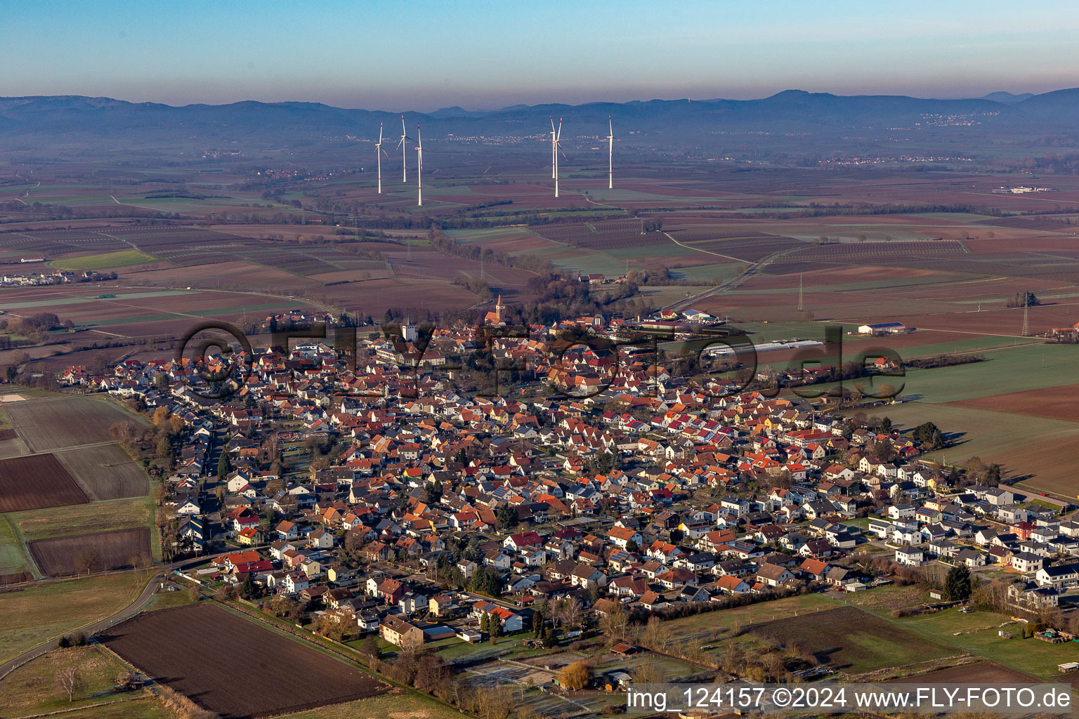 Town View of the streets and houses of the residential areas in front of the Freckenfeld wind farm in Minfeld in the state Rhineland-Palatinate, Germany