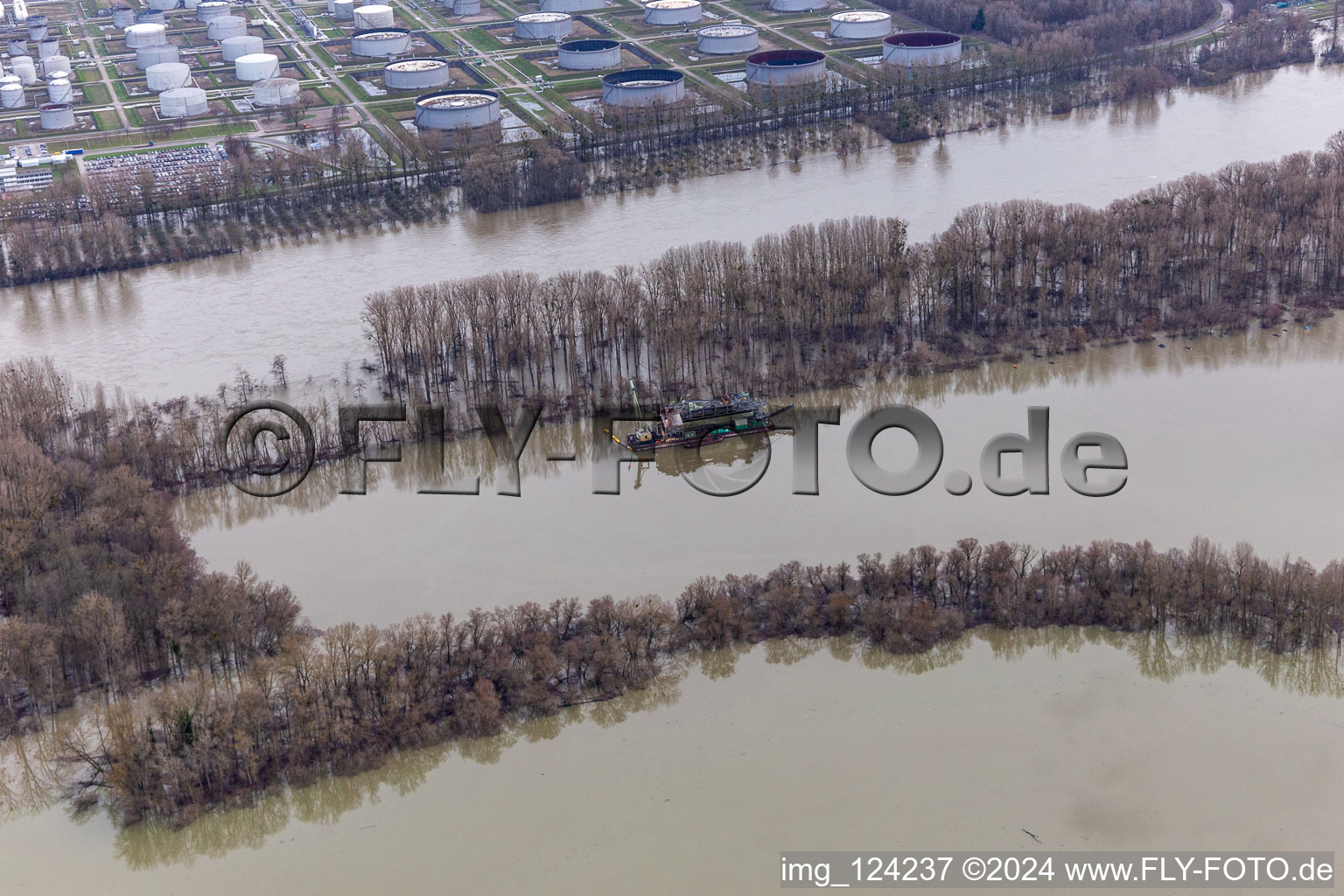 Dredging vessel in the Wörth state port during flooding in the district Maximiliansau in Wörth am Rhein in the state Rhineland-Palatinate, Germany