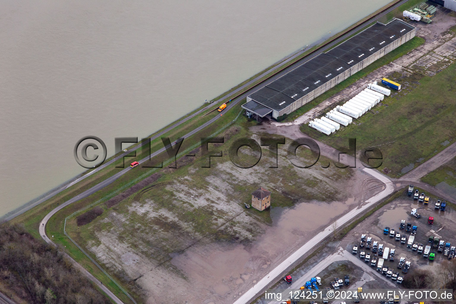 Cleared Daimler truck parking area in the flood area in front of the Rhine dam in the district Maximiliansau in Wörth am Rhein in the state Rhineland-Palatinate, Germany