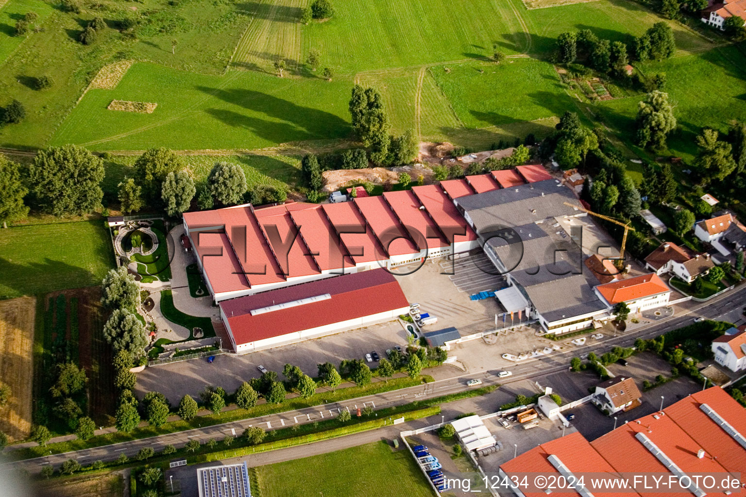 Aerial view of Building and production halls on the premises of Vogelsitze GmbH in Stupferich in the state Baden-Wurttemberg, Germany