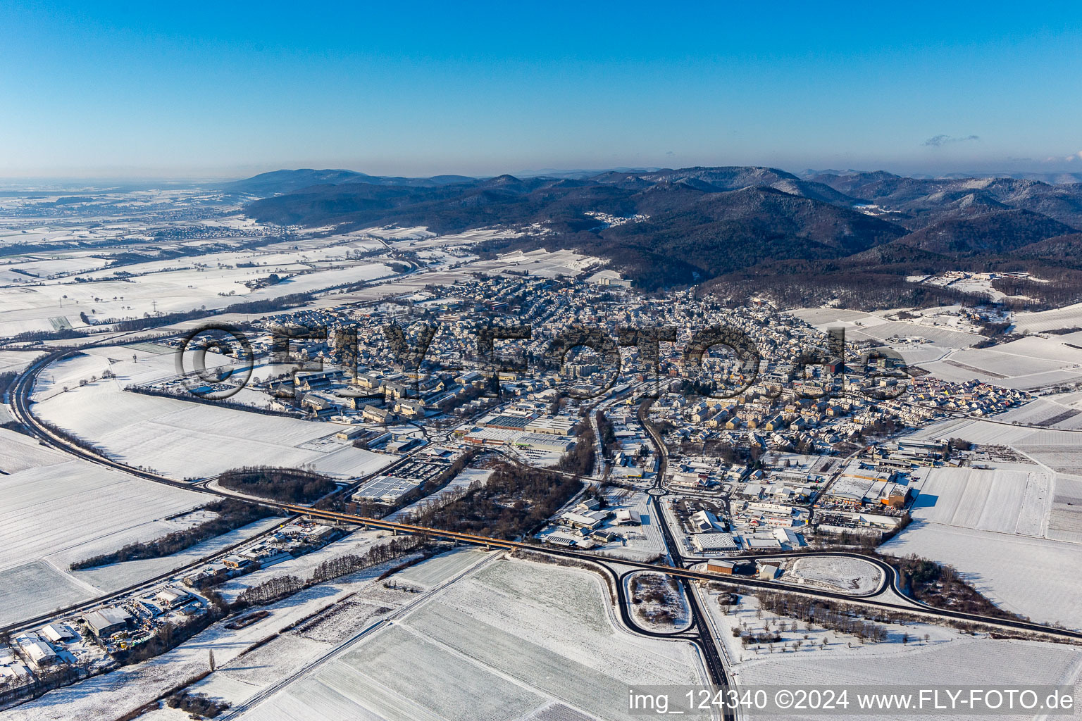 Wintry snowy townscape with streets and houses of the residential areas in Bad Bergzabern in the state Rhineland-Palatinate