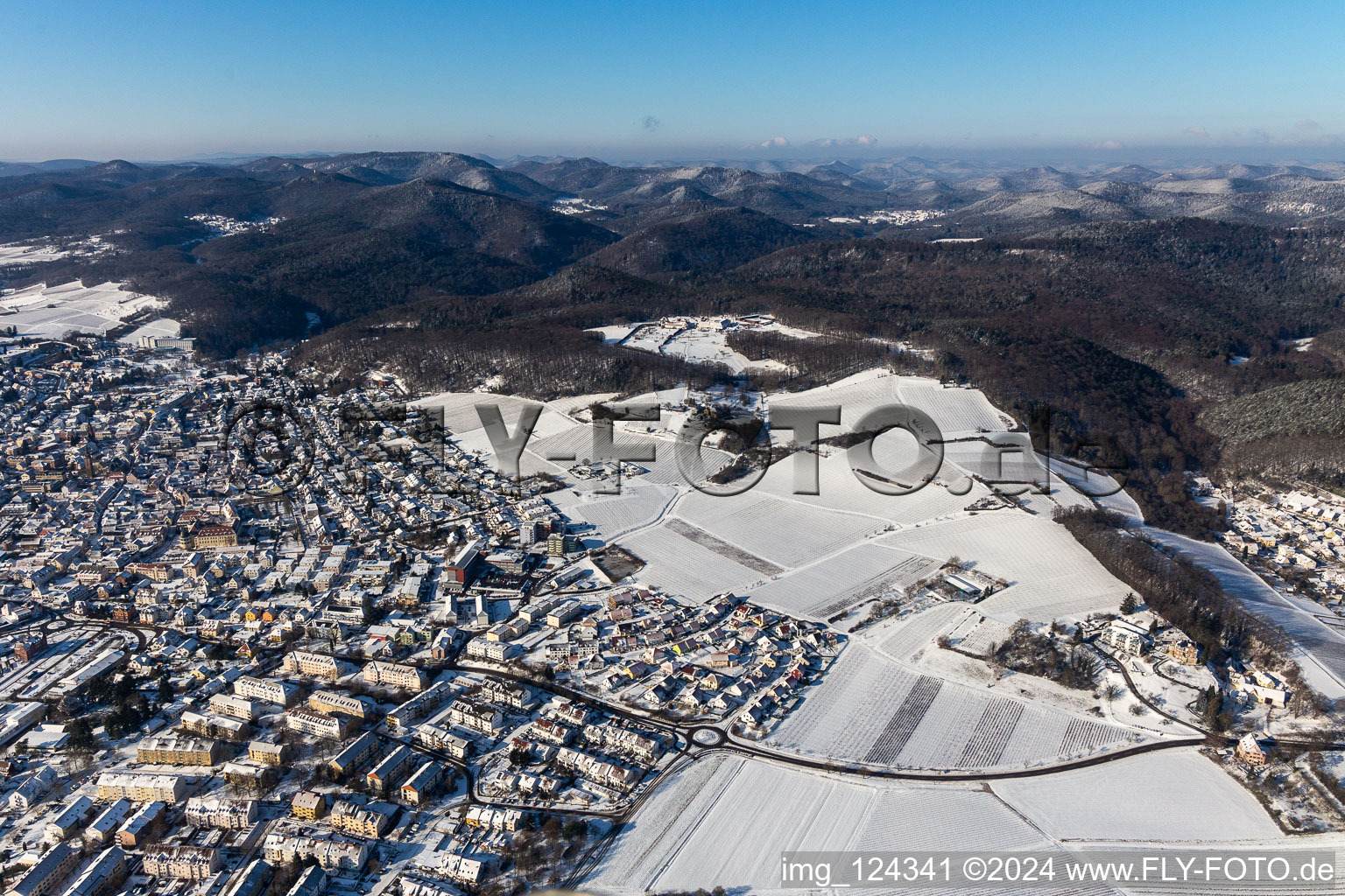 Aerial view of Wintry snowy townscape with streets and houses of the residential areas in Bad Bergzabern in the state Rhineland-Palatinate