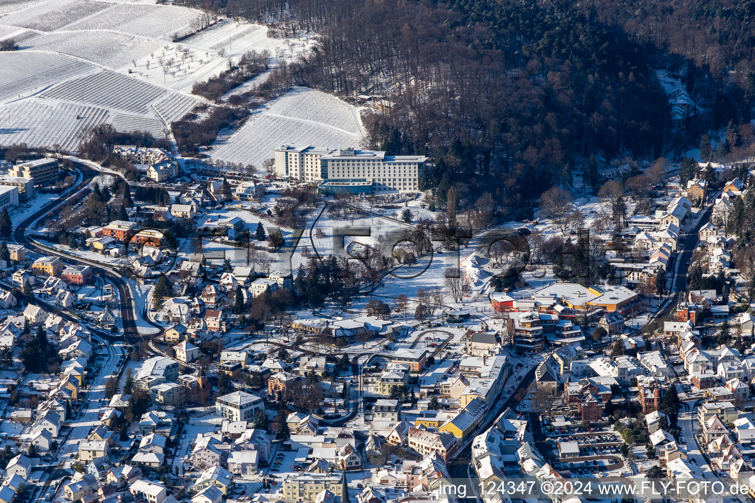 Winter aerial view in the snow from the spa park Bad Bergzabern in Bad Bergzabern in the state Rhineland-Palatinate, Germany