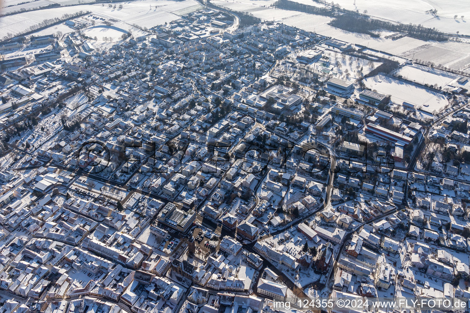 Winter aerial photo in snow from Bad Bergzabern SE in Bad Bergzabern in the state Rhineland-Palatinate, Germany