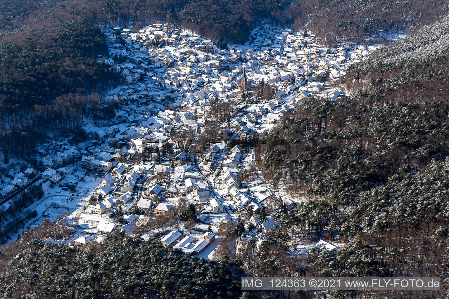 Winter aerial view in the snow in Dörrenbach in the state Rhineland-Palatinate, Germany