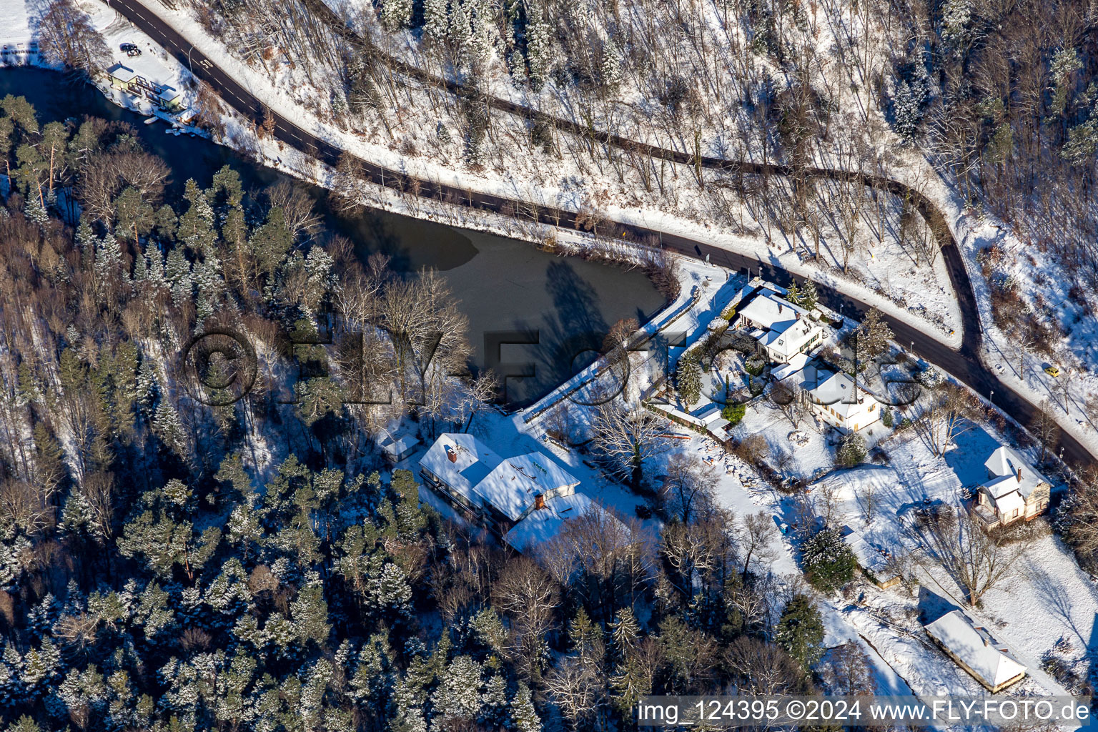 Winter aerial view in the snow of Hotelpension Seeblick in Kurtal in Bad Bergzabern in the state Rhineland-Palatinate, Germany