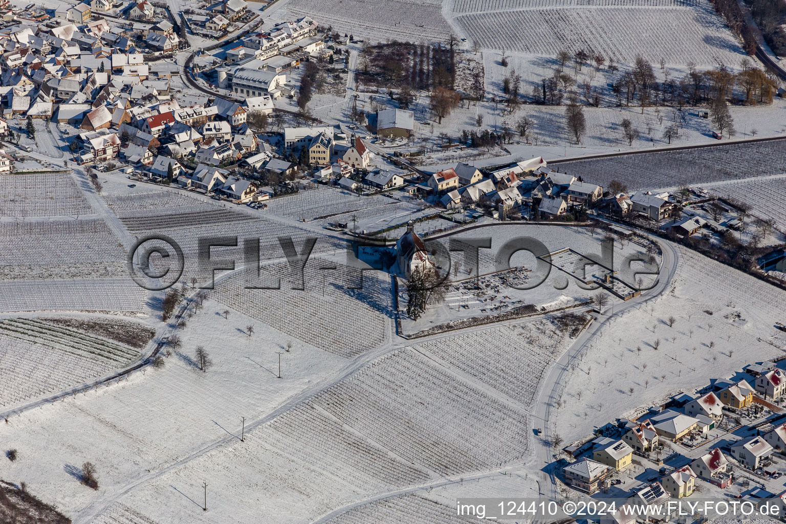 Winter aerial view in the snow of St. Dionysius Chapel in the district Gleiszellen in Gleiszellen-Gleishorbach in the state Rhineland-Palatinate, Germany
