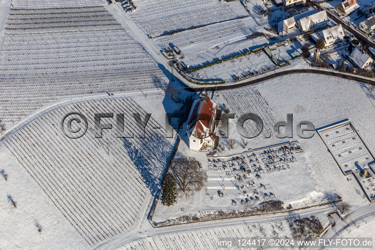 Wintry snowy churches building the chapel Dionysius and grave-yard in the wine-yards near the district Gleishorbach in Gleiszellen-Gleishorbach in the state Rhineland-Palatinate