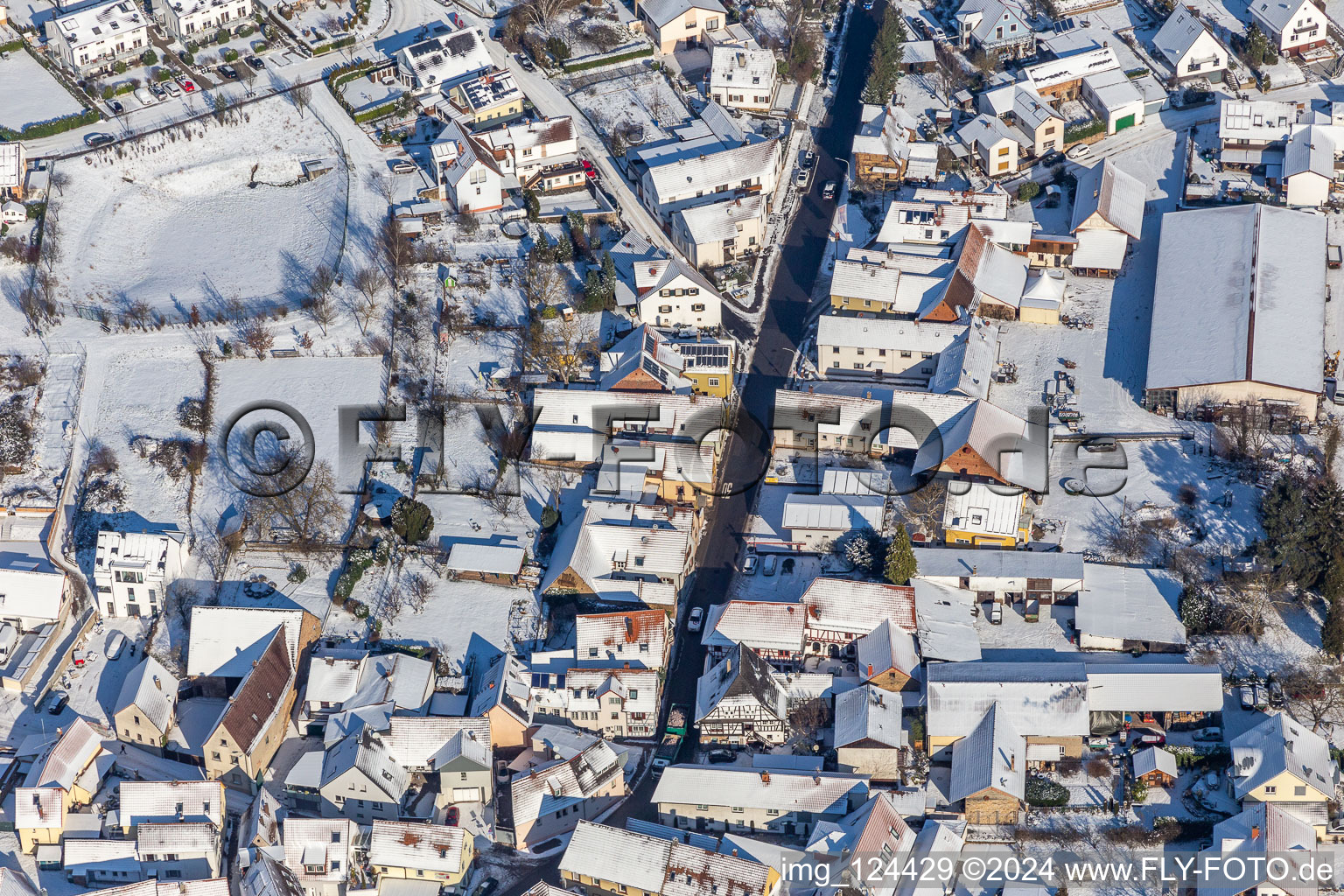 Winter aerial view in the snow of the wine route Klingenmünster in Klingenmünster in the state Rhineland-Palatinate, Germany