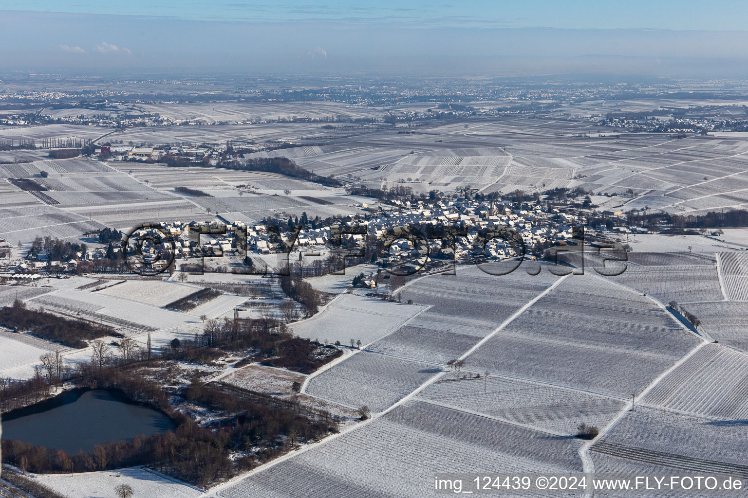 Winter aerial view in the snow in Göcklingen in the state Rhineland-Palatinate, Germany