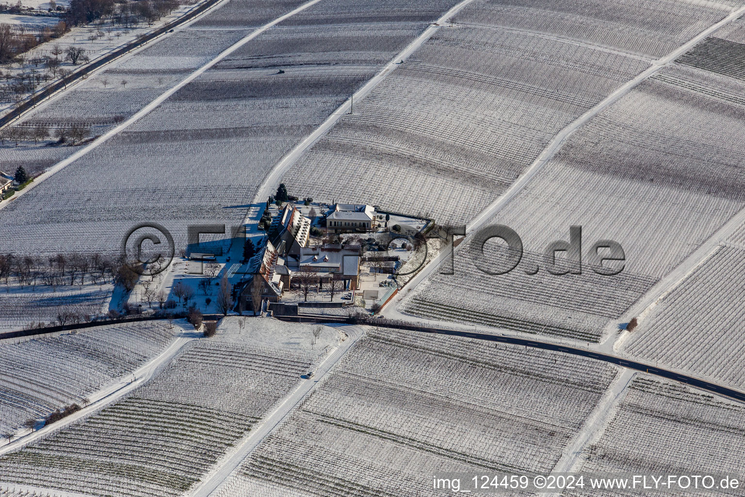 Aerial view of Wintry snowy complex of the hotel building " Leinsweiler Hof " in Leinsweiler in the state Rhineland-Palatinate, Germany