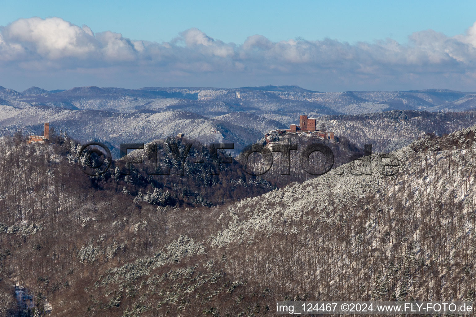 Winter aerial view in the snow of the three castles Trifels, Anebos Scharfenberg from the Birnbachtal in Waldrohrbach in the state Rhineland-Palatinate, Germany