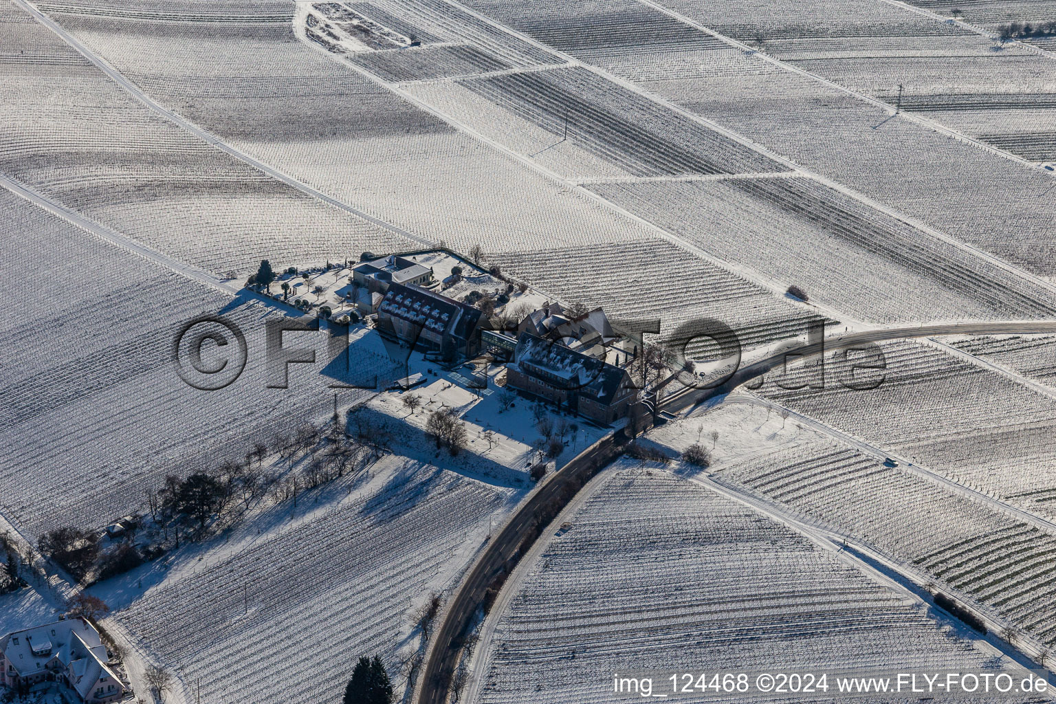 Aerial photograpy of Wintry snowy complex of the hotel building " Leinsweiler Hof " in Leinsweiler in the state Rhineland-Palatinate, Germany