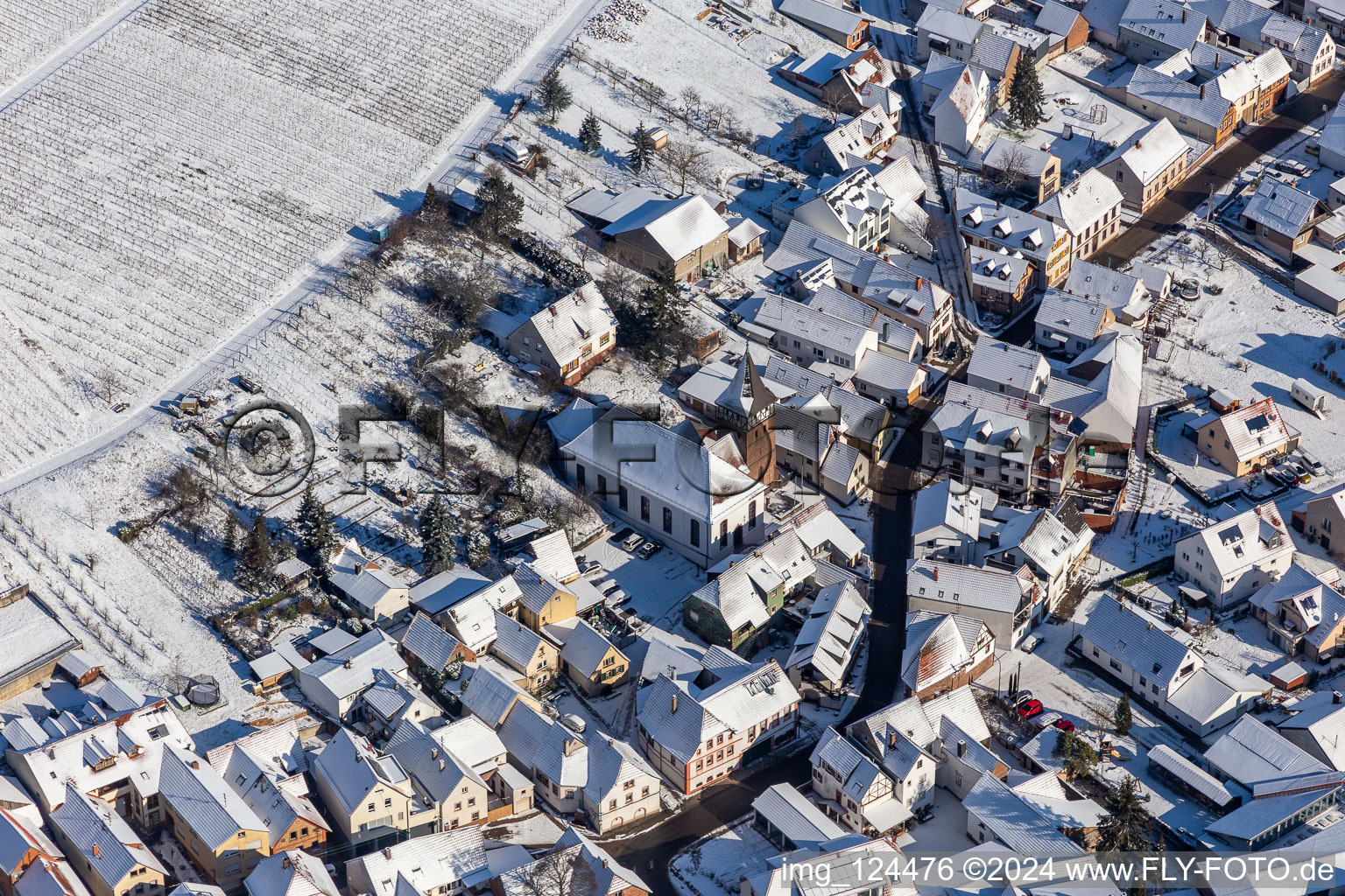 Winter aerial photograph in the snow of the Catholic parish and pilgrimage church Ranschbach in Ranschbach in the state Rhineland-Palatinate, Germany