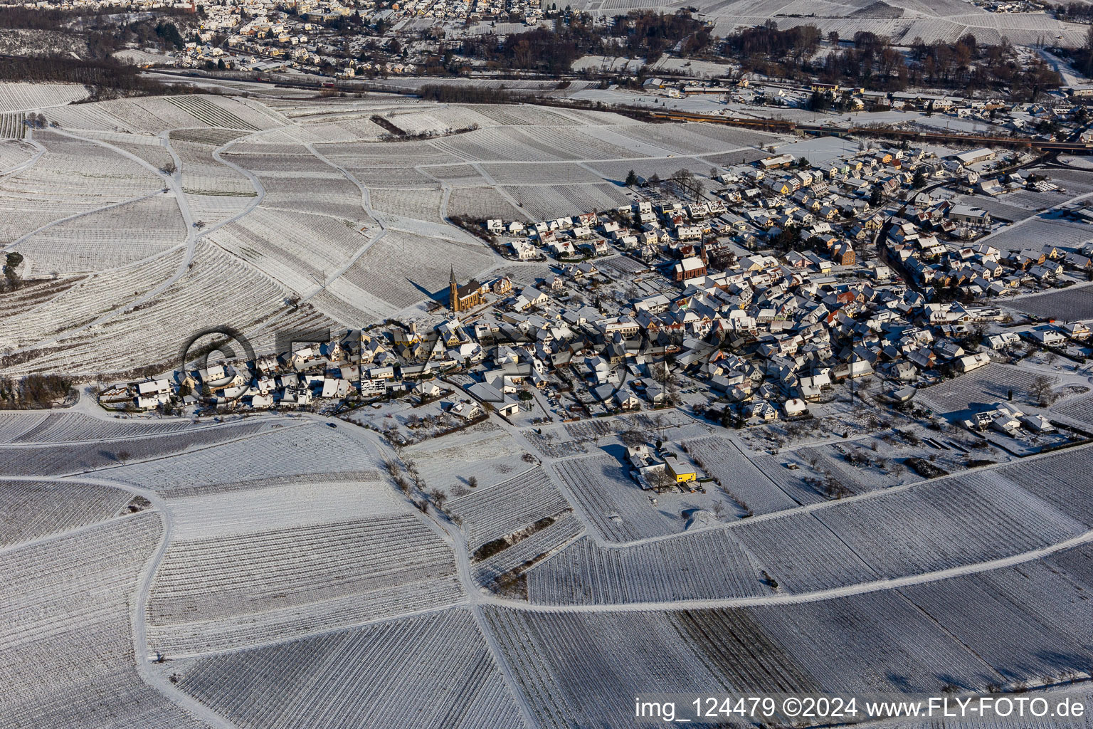 Aerial view of Winter aerial view in the snow in Birkweiler in the state Rhineland-Palatinate, Germany