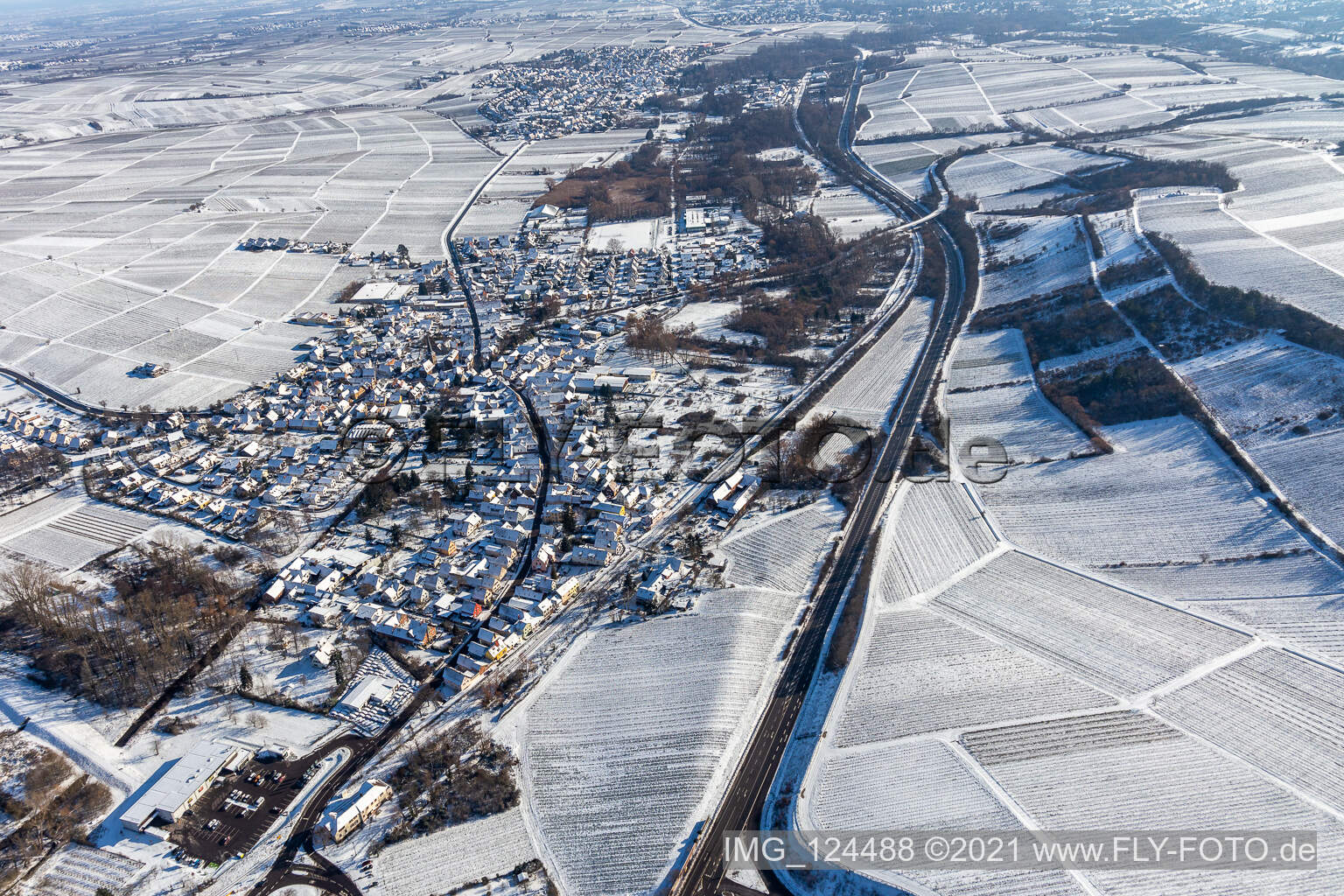 Winter aerial view in the snow in Siebeldingen in the state Rhineland-Palatinate, Germany