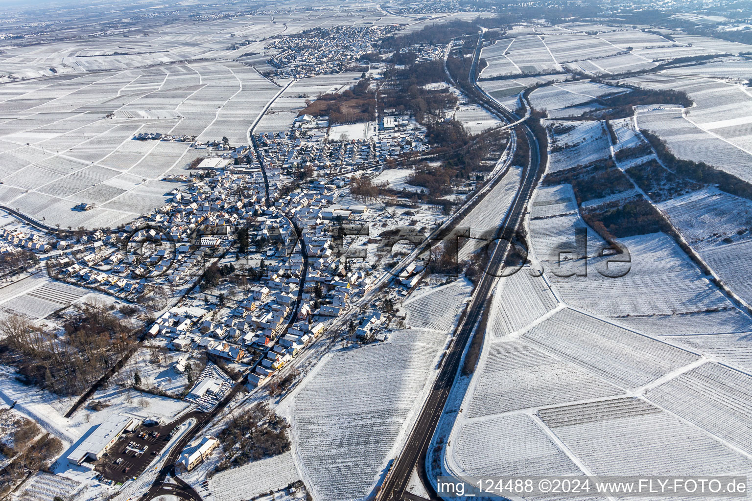 Winter aerial view in the snow in Siebeldingen in the state Rhineland-Palatinate, Germany