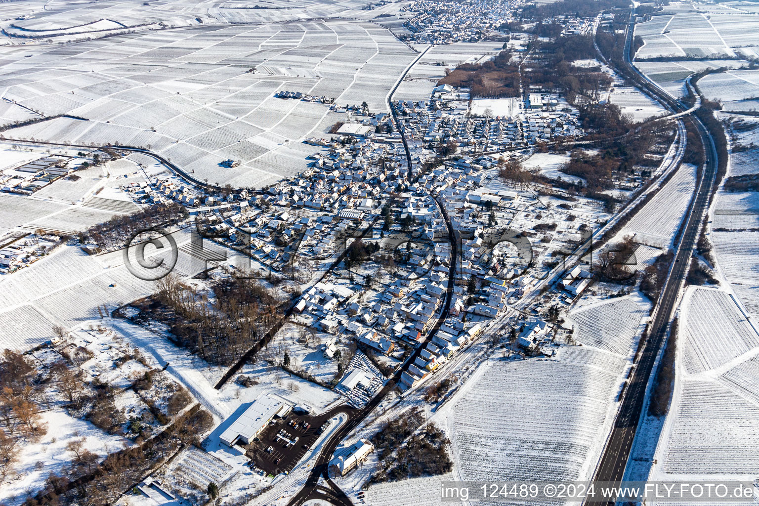 Wintry snowy Town View of the streets and houses of the residential areas in Siebeldingen in the state Rhineland-Palatinate, Germany