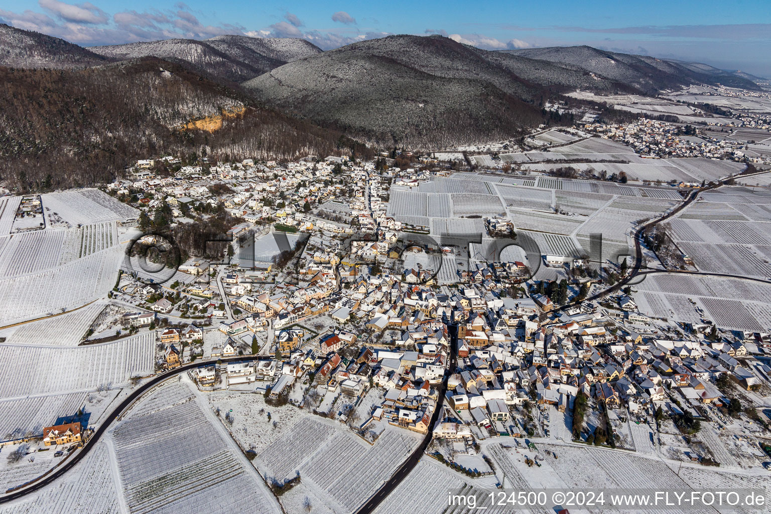 Aerial view of Wintry snowy Village - view on the edge of wine yards in Frankweiler in the state Rhineland-Palatinate, Germany