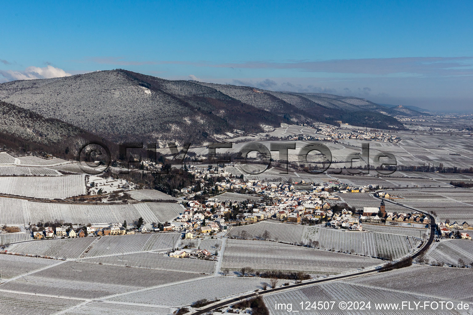 Winter aerial view in the snow in Burrweiler in the state Rhineland-Palatinate, Germany