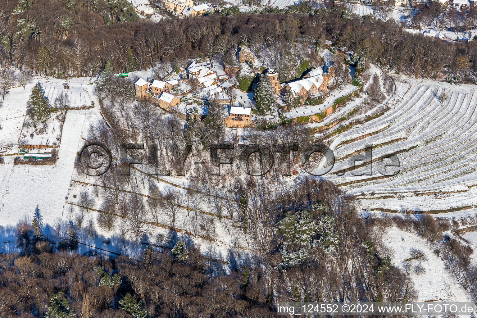 Wintry snowy building of the restaurant Schloss Kropsburg in Sankt Martin in the state Rhineland-Palatinate, Germany