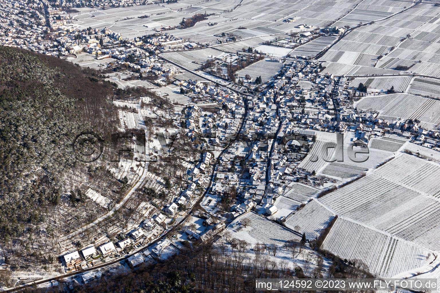 Winter aerial view in the snow in the district Hambach an der Weinstraße in Neustadt an der Weinstraße in the state Rhineland-Palatinate, Germany