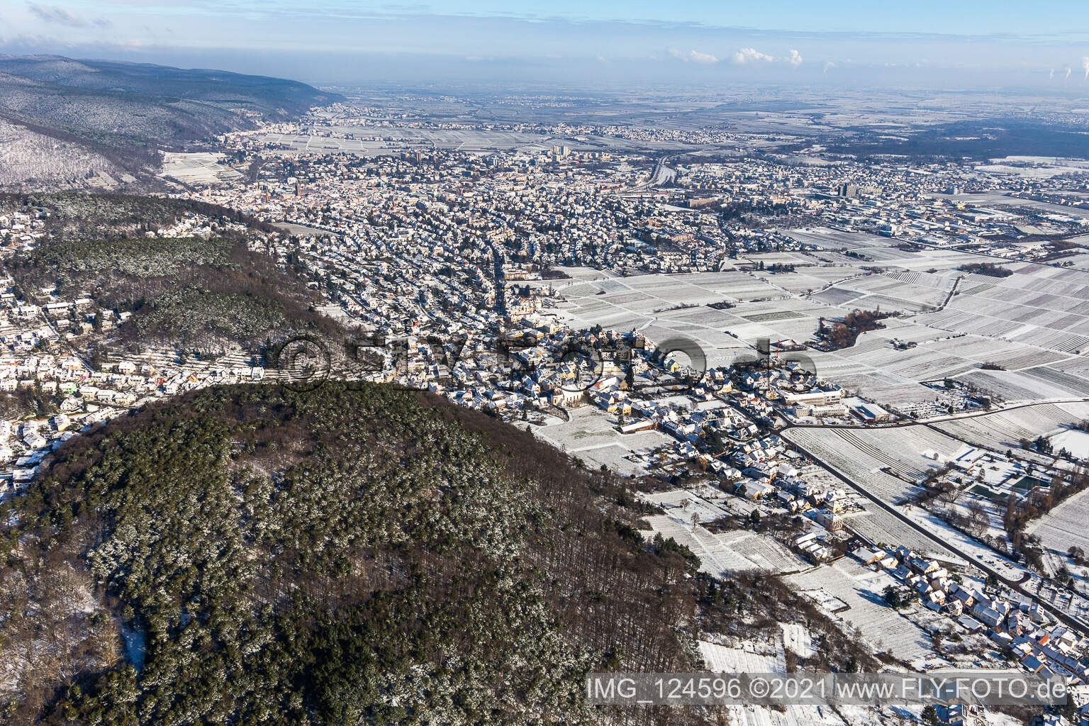 Winter aerial view in the snow in Neustadt an der Weinstraße in the state Rhineland-Palatinate, Germany