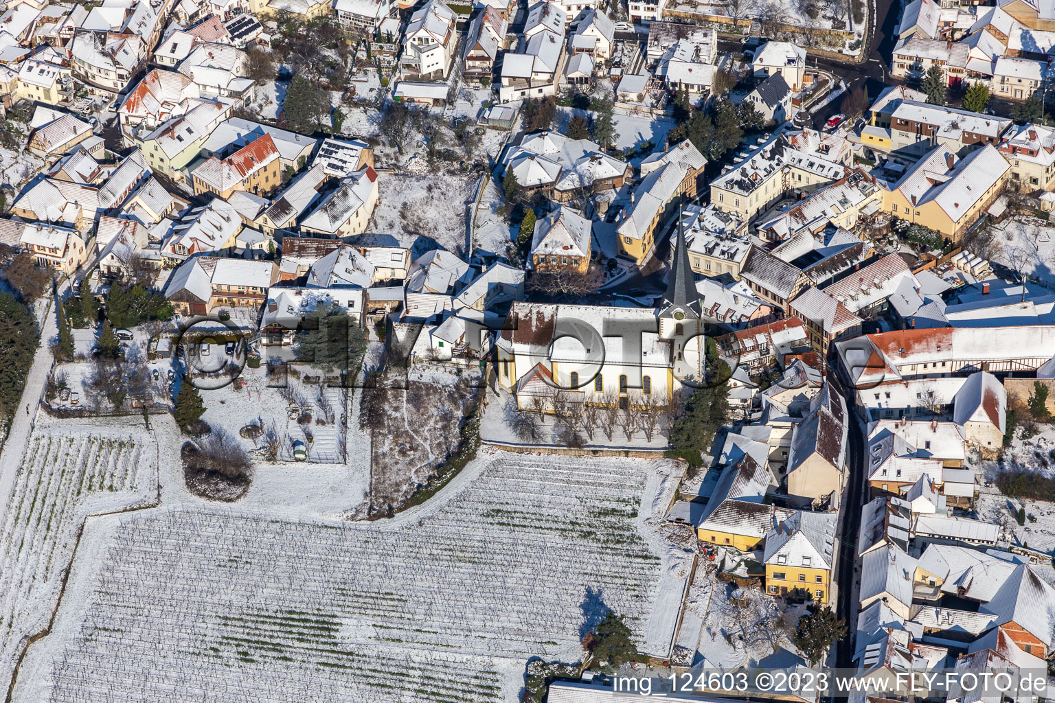 Winter aerial view in the snow of the Catholic Church of St. Jakob in the district Hambach an der Weinstraße in Neustadt an der Weinstraße in the state Rhineland-Palatinate, Germany