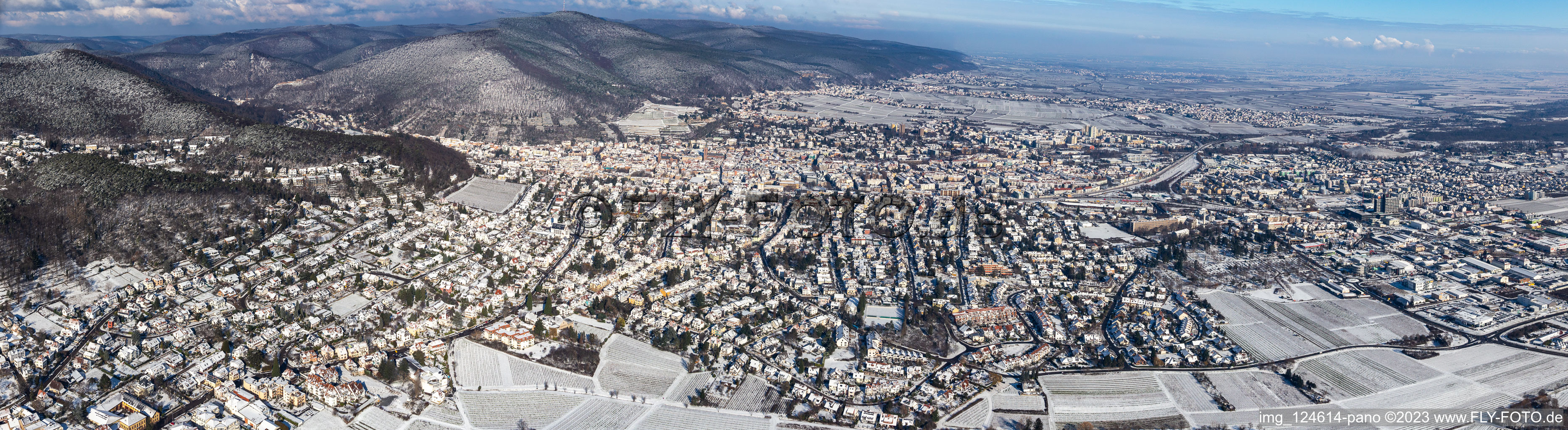 Panorama winter aerial view in the snow in Neustadt an der Weinstraße in the state Rhineland-Palatinate, Germany