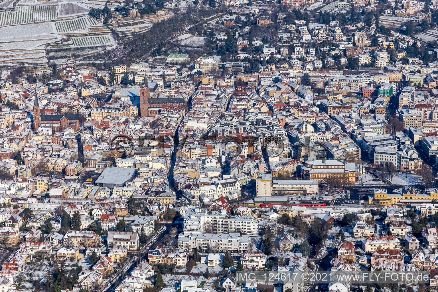 Winter aerial view in the snow of the main street in Neustadt an der Weinstraße in the state Rhineland-Palatinate, Germany