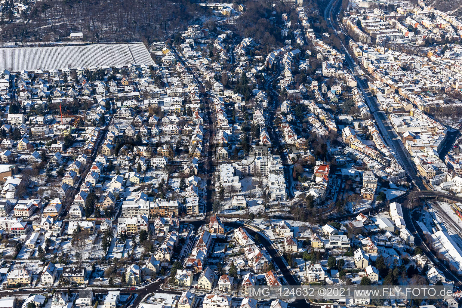 Winter aerial view in the snow of the Waldstraße in Neustadt an der Weinstraße in the state Rhineland-Palatinate, Germany