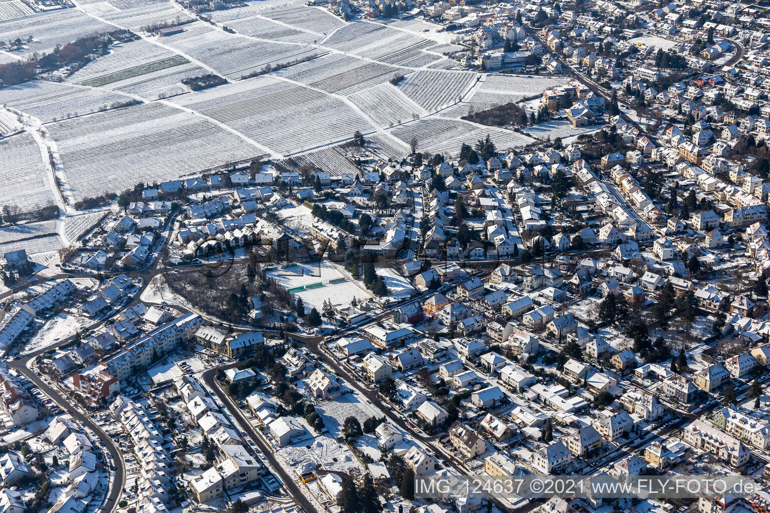 Winter aerial view in the snow Grünwiesenweg in Neustadt an der Weinstraße in the state Rhineland-Palatinate, Germany