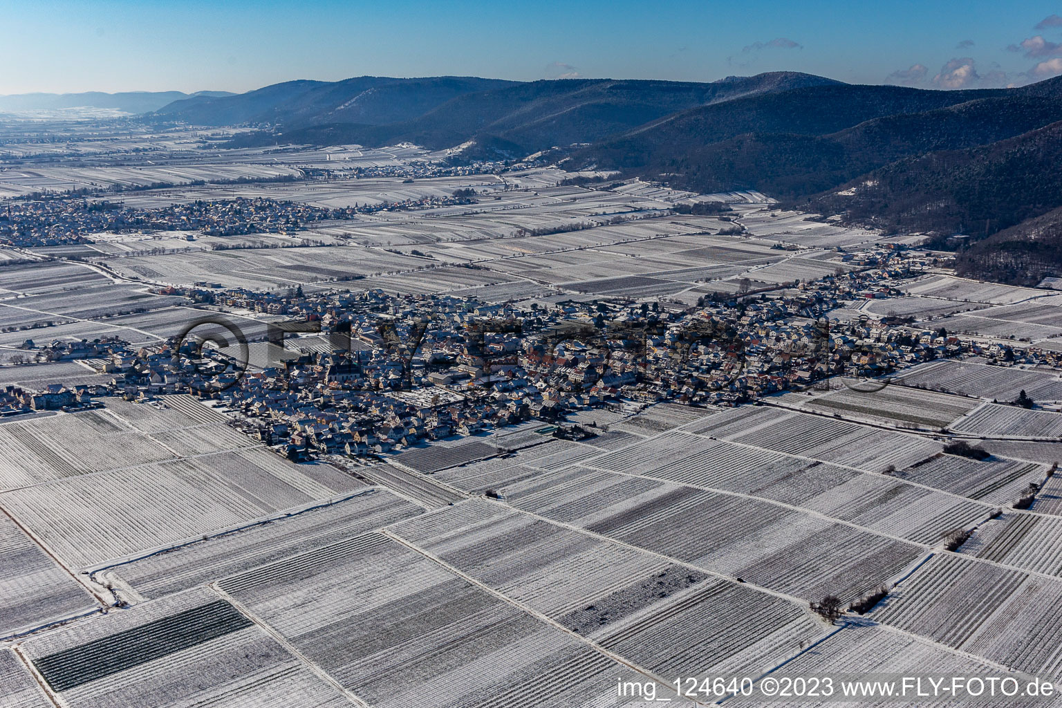 Winter aerial view in the snow in the district Diedesfeld in Neustadt an der Weinstraße in the state Rhineland-Palatinate, Germany