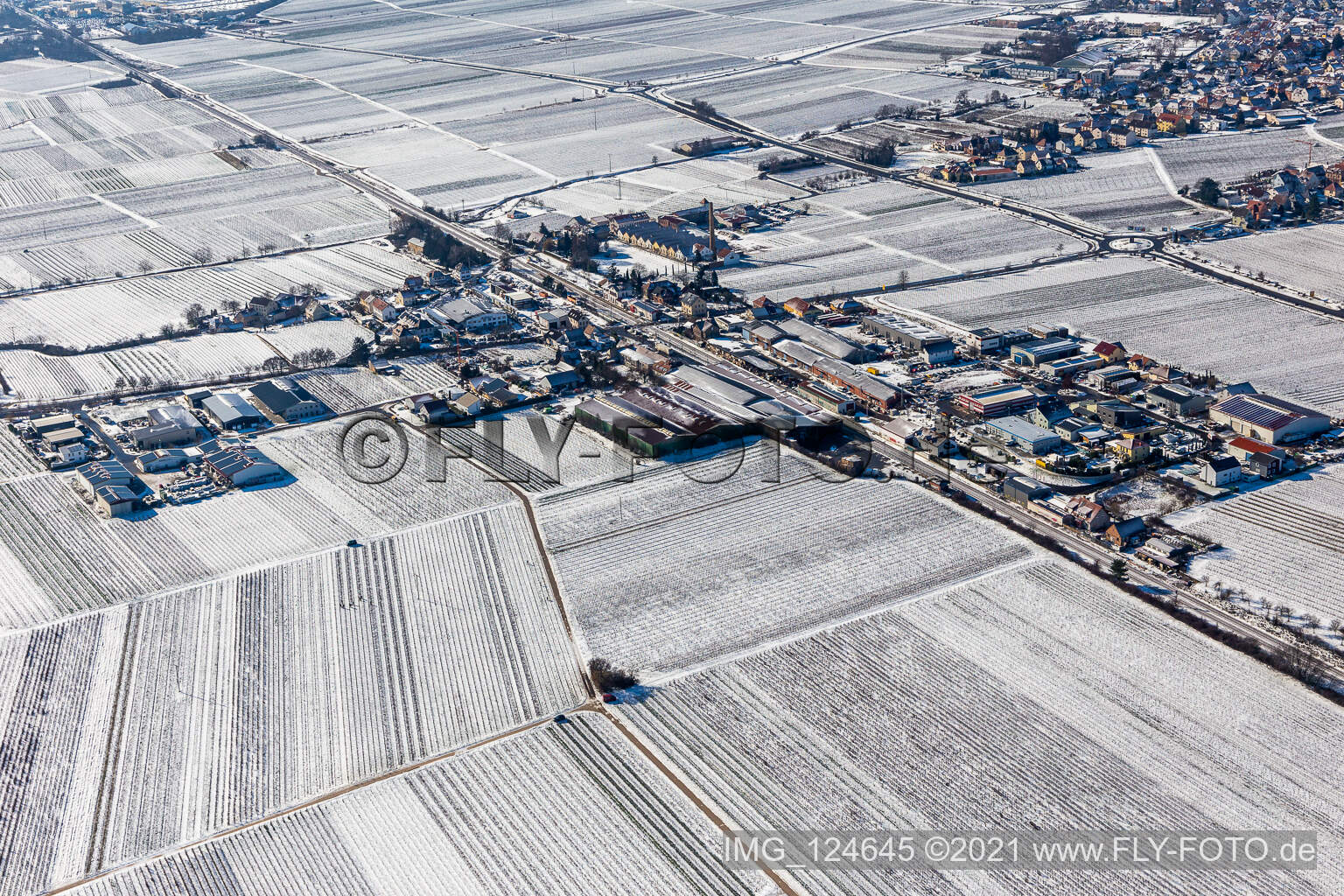 Aerial view of Winter aerial view in the snow industrial area Bordmühle in Kirrweiler in the state Rhineland-Palatinate, Germany