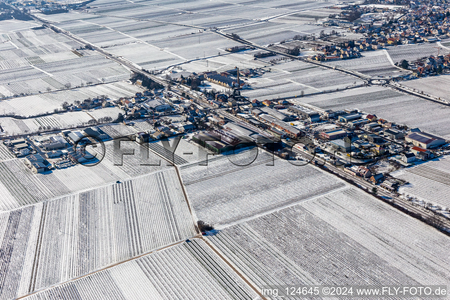 Aerial view of Winter aerial view in the snow industrial area Bordmühle in Kirrweiler in the state Rhineland-Palatinate, Germany