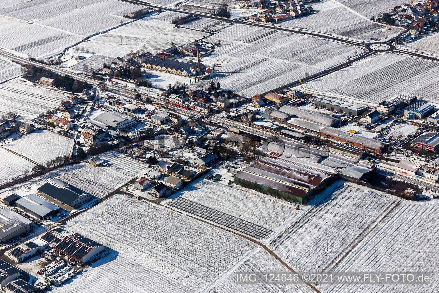Aerial view of Winter aerial view in the snow industrial area Bordmühle in Kirrweiler in the state Rhineland-Palatinate, Germany
