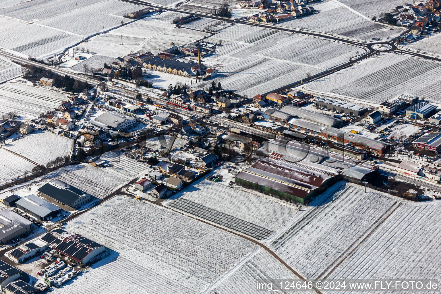 Aerial view of Winter aerial view in the snow industrial area Bordmühle in Kirrweiler in the state Rhineland-Palatinate, Germany