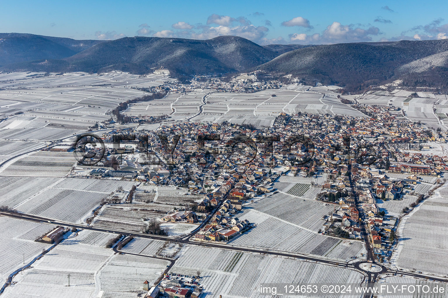 Wintry snowy village - view on the edge of wine yards in Maikammer in the state Rhineland-Palatinate