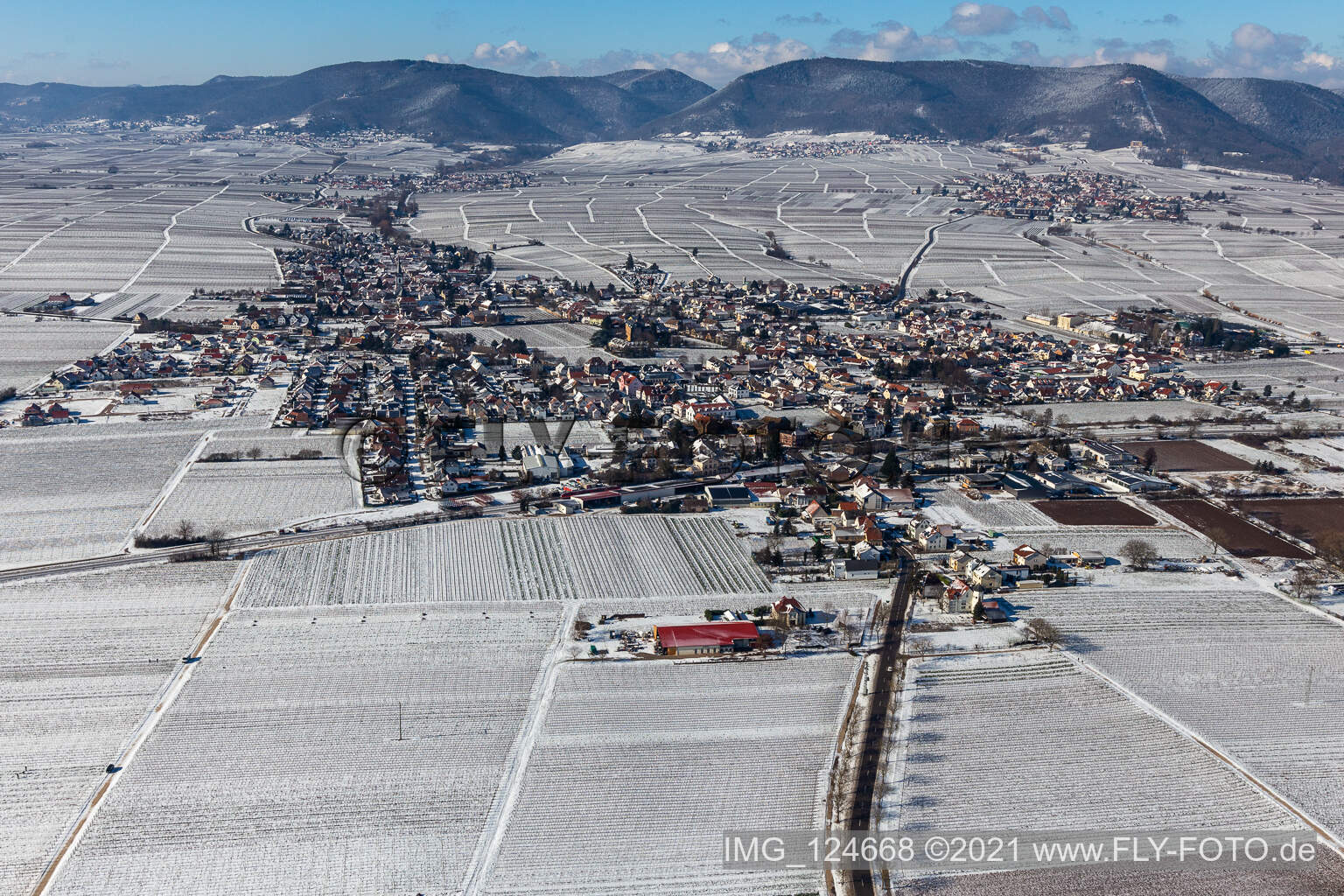 Winter aerial view in the snow in Edesheim in the state Rhineland-Palatinate, Germany